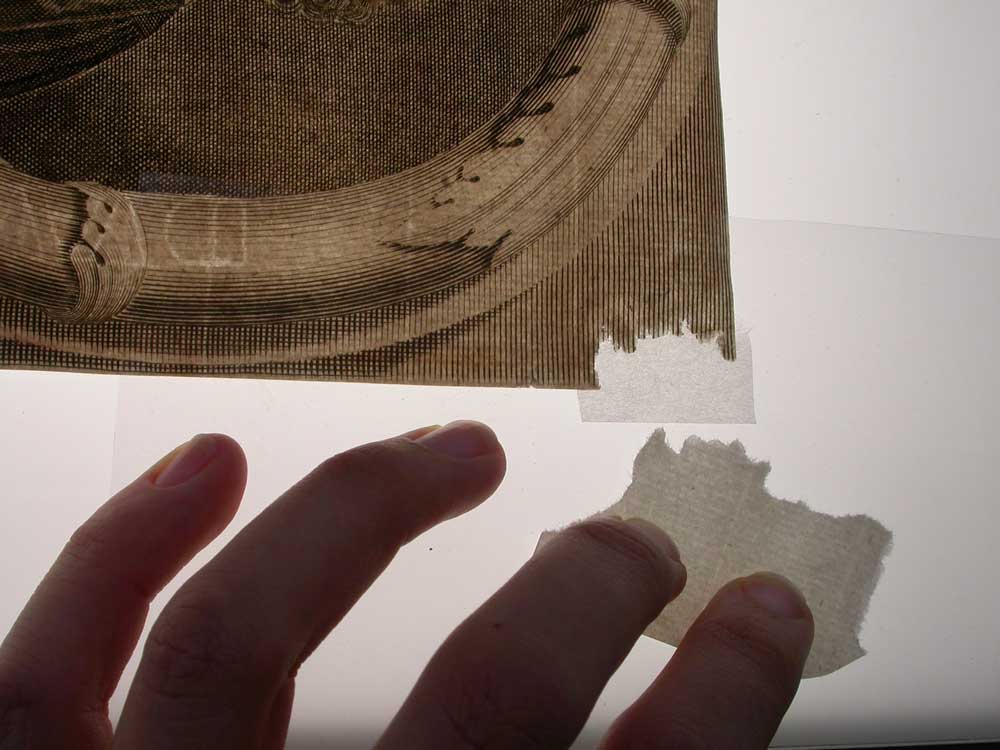 Checking the fit on a matching paper repair